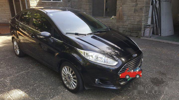 Black Ford Fiesta 2014 at 64000 km for sale