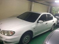 For sale white Nissan Cefiro brougham