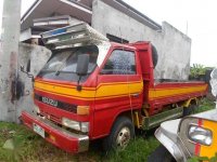 Isuzu Elf 4BC1 14ft Dropside Red Truck For Sale 