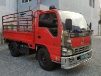 2011 Isuzu Elf truck dropside for sale