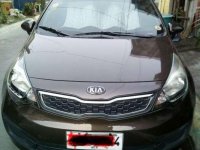 Kia Rio sedan 2014 model wendy brown color,