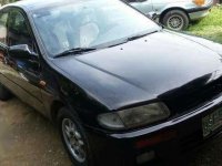 Mazda Familia 1997 Black Sedan For Sale 