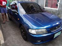 Mazda 323 Gen 2.5 Blue Sedan For Sale 