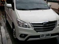 Toyota Innova G 2015 model pearl white. 