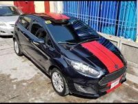 Ford Fiesta 2015 assume balance grab