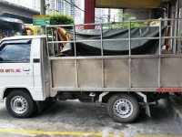 2010 Mitsubishi L300 stake body for sale 