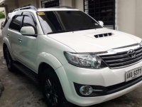 Toyota Fortuner G 2015 acquired black edition