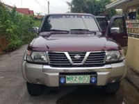 nissan patrol 2002s At 4x4 gas