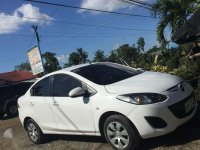 Mazda 2 Sedan white (slightly used) 2014 model