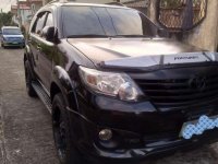 FOR SALE!!! A black Toyota Fortuner 2011