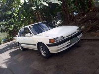 Mazda 323 Familia 97 model MT