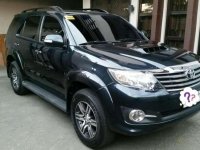 TOYOTA Fortuner G AT 2015 model smells new good as new