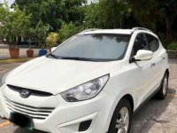Hyundai Tucson 2011 theta white gasoline Rush