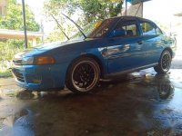 Mitsubishi Lancer pizza pie 1998 model power steering