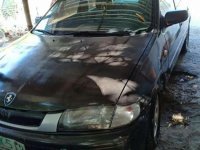 Like new Mazda 323 sedan for sale