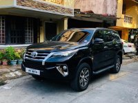 Black Toyota Fortuner 2016 Automatic Diesel for sale in Quezon City