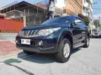 Selling Black Mitsubishi Strada 2016 Manual Diesel at 35000 km in Quezon City