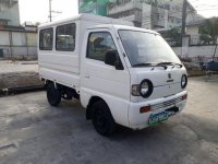 Selling Suzuki Multi-Cab 2010 Manual Gasoline at 100000 km in Quezon City