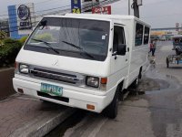 Selling White Mitsubishi L300 2012 at 70000 km in Quezon City