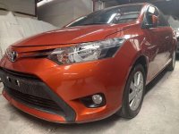 Selling Orange Toyota Vios 2015 Sedan in Quezon City