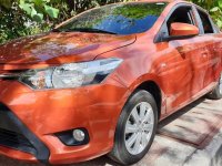 Selling Orange Toyota Vios 2015 in Quezon City