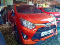 Orange Toyota Wigo 2019 for sale in Quezon City 