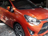 Orange Toyota Wigo 2019 Manual Gasoline for sale in Quezon City