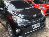 Sell Black 2014 Toyota Wigo at 20000 km in Quezon City