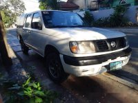 White Nissan Frontier 2010 at 70000 km for sale in Quezon City