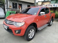 Selling Red Mitsubishi Strada 2014 at 49000 km in Quezon City