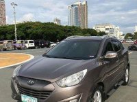 Selling Brown Hyundai Tucson 2011 Automatic Gasoline at 83000 km in Quezon City