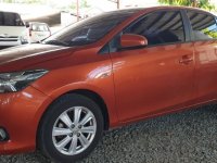 Orange Toyota Vios 2015 at 10000 km for sale in Quezon City