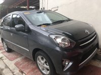 Gray Toyota Wigo 2015 Hatchback Manual Gasoline for sale in Quezon City