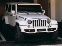 White Jeep Wrangler 2016 at 27000 km for sale