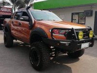 Orange Ford Ranger 2015 at 20000 km for sale