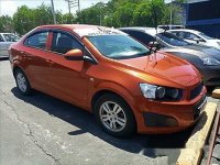 Orange Chevrolet Sonic 2015 at 30303 km for sale 