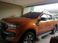 Orange Ford Ranger 2016 Automatic Diesel for sale in Manila