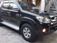 Black Toyota Hilux 2010 at 85000 km for sale in Manila