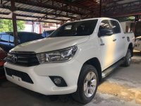 Selling White Toyota Hilux 2016 in Quezon City