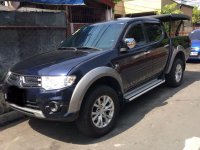 Selling Mitsubishi Strada 2014 Automatic Diesel in Quezon City