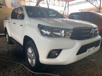 White Toyota Hilux 2016 Manual Diesel for sale in Quezon City