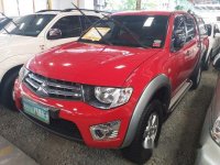 Red Mitsubishi Strada 2013 at 79025 km for sale in Quezon City
