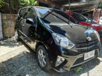 Sell Black 2014 Toyota Wigo in Quezon City