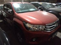 Selling Orange Toyota Hilux 2017 in Makati 