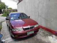 Red Nissan Sentra 2000 at 118000 km for sale