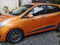 Sell Orange 2015 Hyundai Grand i10 Hatchback at 31000 km 
