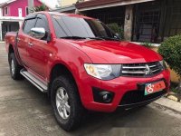Red Mitsubishi Strada 2014 Automatic Diesel for sale 