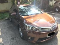 Brown Toyota Corolla 2014 for sale in Quezon City