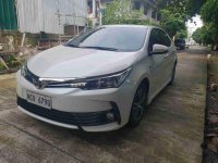 Selling White Toyota Corolla Altis 2018 Automatic Gasoline at 7000 km 