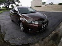 Sell Brown 2014 Toyota Corolla Altis Automatic Gasoline 